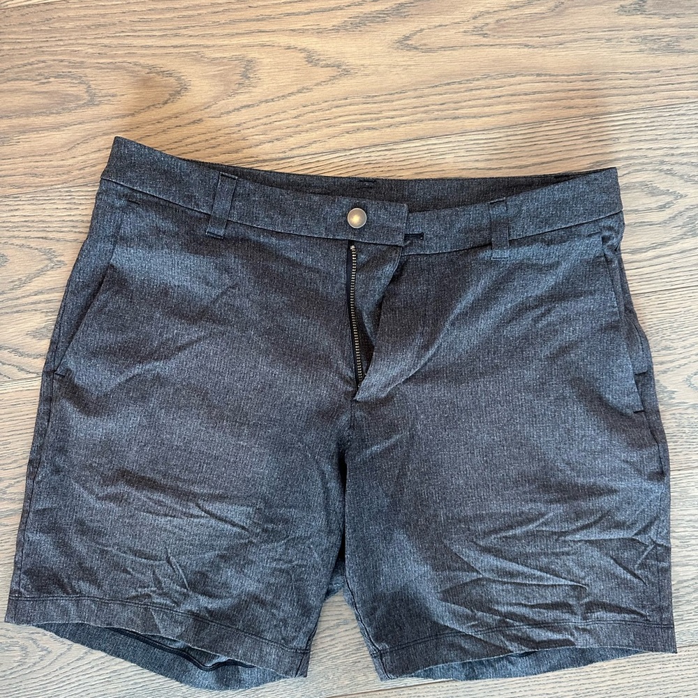 Lululemon men’s shorts. Dark heather grey/ blue ish tone.